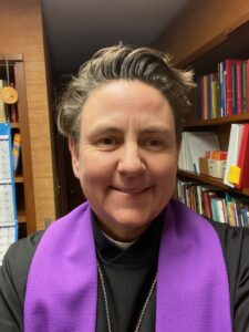 Picture of Pr. Janet in her office wearing a purple stole.